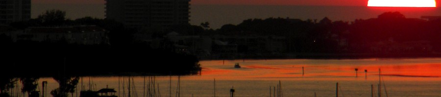 Sarasota Sailing Squadron boats ride at anchor in the mooring field. Photo by Norman Schimmel