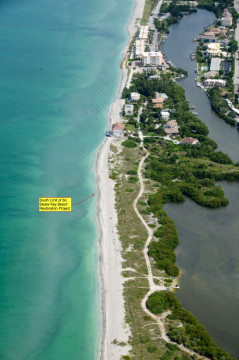 An aerial photo taken in July shows the Gulf of Mexico lapping at a homeowner’s pool on one stretch of the south Siesta renourishment project area. Image courtesy Sarasota County