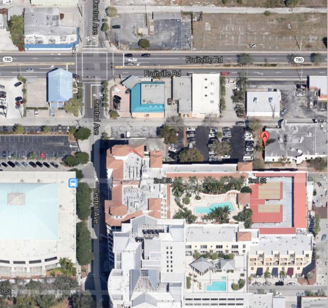 A flag in this aerial view shows the site of the former United Way building in downtown Sarasota. Image from Google Maps