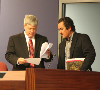 School Board attorney Art Hardy (left) and board Chair Frank Kovach confer. File photo