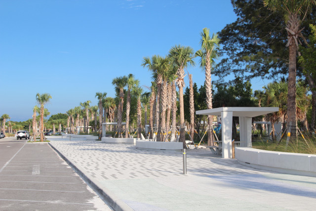 New concrete picnic shelters stand adjacent to the promenade at Siesta Public Beach. Rachel Hackney photo