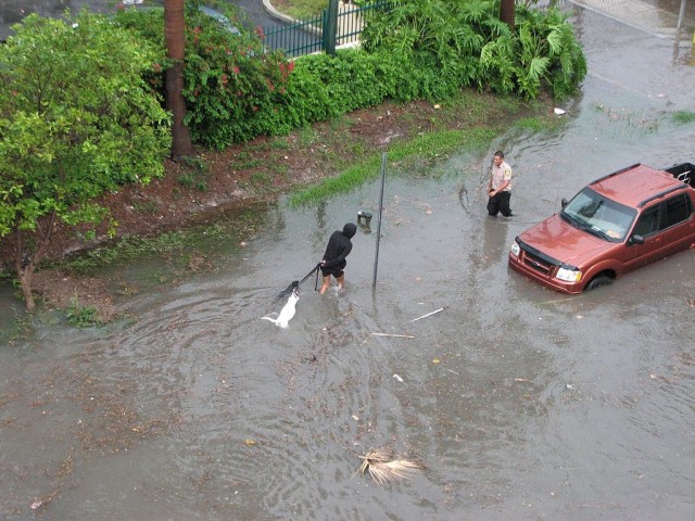 A South Beach street in Miami is flooded in 2009. Photo by maxstrz via Wikimedia