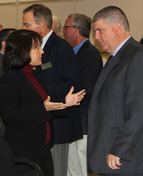 Mireya Eavey talks with Todd Bowden, executive director of the Suncoast Technical College during the 2014 Convocation of Governments at the college. File photo