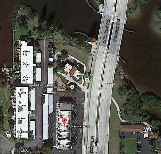 An aerial view shows the Hamilton Building (marked by the red balloon) and the vacant area under the bridge. Image from Google Maps