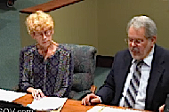 Kate Lowman and Mike Taylor address the City Commission on April 4. File photo