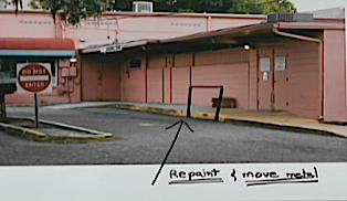 Kate Lowman showed the City Commission a photo of the current loading area, suggesting it could be improved. News Leader photo