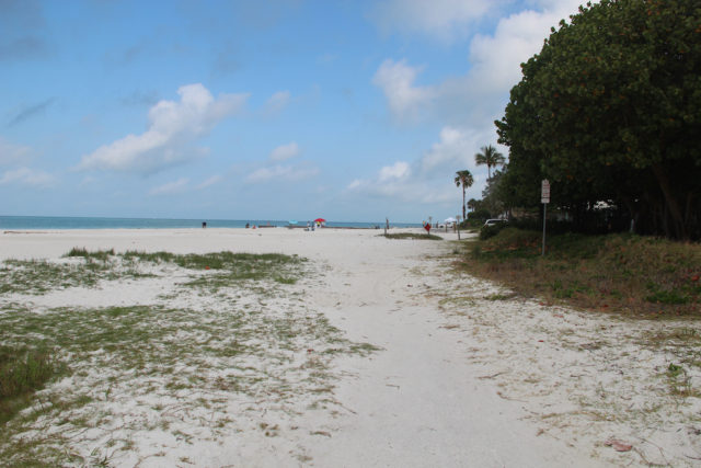 The view of the abandoned segment of North Beach Road segment looking north shows mostly sand. File photo