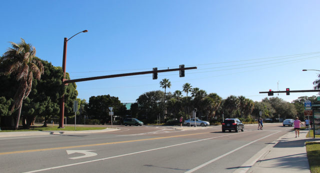 Pedestrians cross Beach Road at the Stickney Point Road intersection in this 2014 file photo.