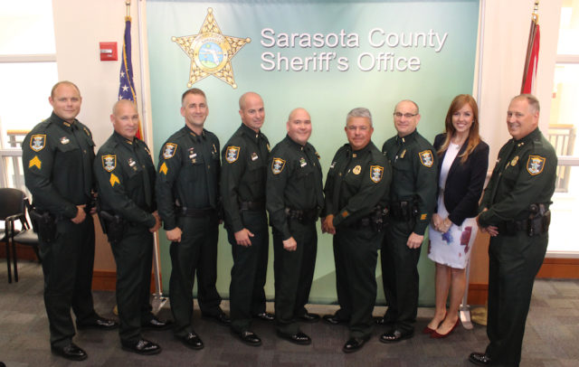 (From left) Sgts. Matt Tuggle, Gregory Cramer and James Darby, Lts. Bryan Ivings and Donny Kennard, Capt. Tim Enos, Lt. Brian Gregory, Community Affairs Director Kaitlyn Johnston and Sheriff Tom Knight. Contributed photo