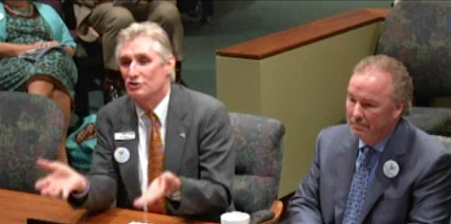 Jon Thaxton (left) and Michael Klauber address the City Commission. News Leader photo