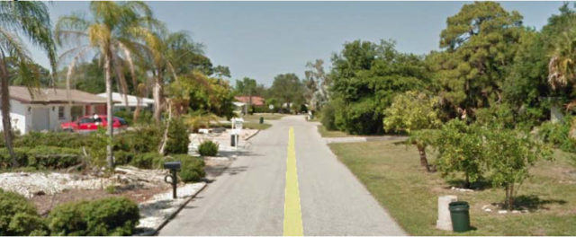 A photo in the application shows one of the neighboring residential streets. Image courtesy Sarasota County