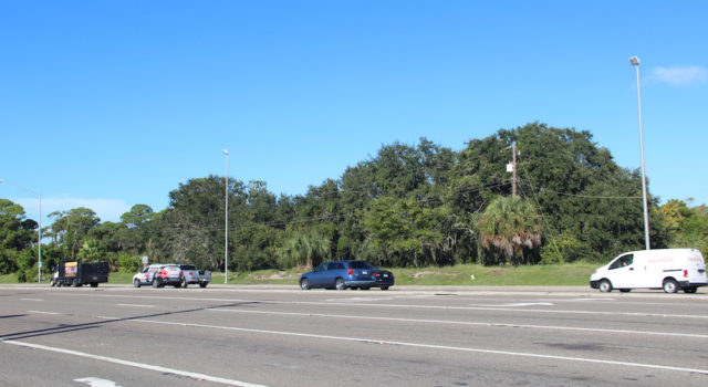 Traffic flows west on Stickney Point Road past the Siesta Promenade site early on an October morning. Rachel Hackney photo
