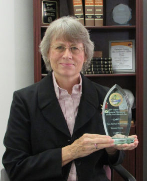 Sarasota County Tax Collector Barbara Ford-Coates holds the award she recently received from a state organization. Contributed photo
