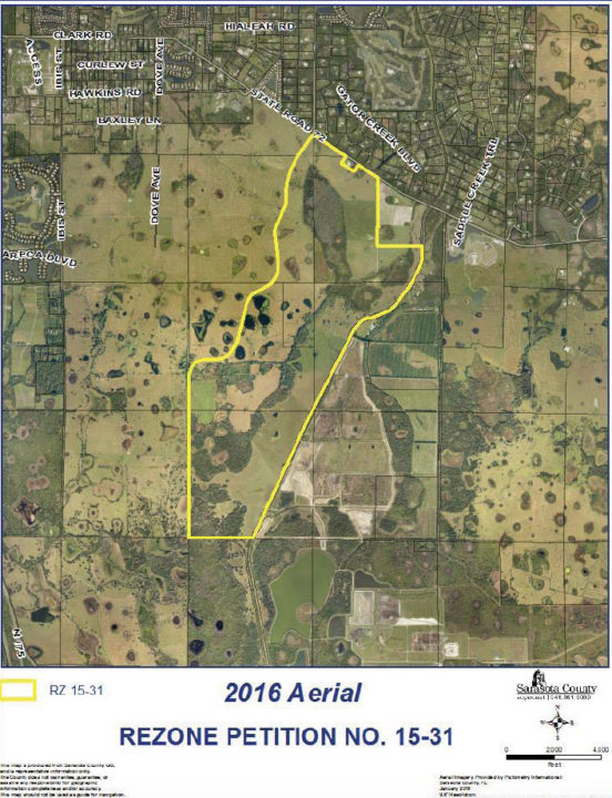 An aerial map shows the location of the proposed development (outlined in yellow). Image courtesy Sarasota County