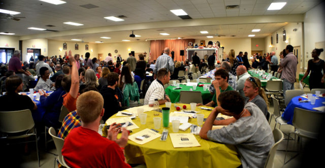 Attendees enjoy the Thanksgiving dinner in 2013. File photo