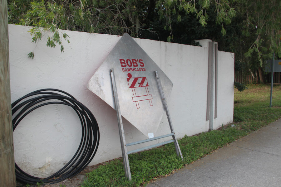Bob’s Barricades sign against wall in Pinecraft Jan. 6 2022